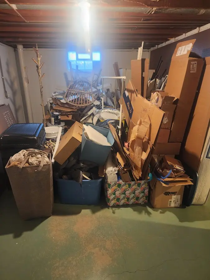 Roll-off dumpster container at job site for Concrete Dumpster Rental in New Hampton